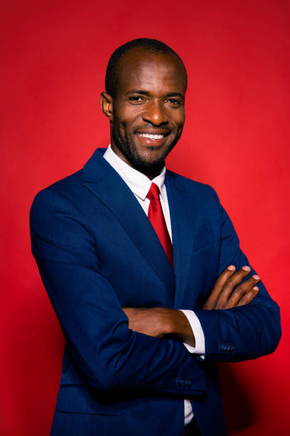 istock Vertical portrait of attractive nice good-looking imposing elegant handsome man in formal wear cross fold hands on chest look at camera stand isolated on red shine background 1060892910
