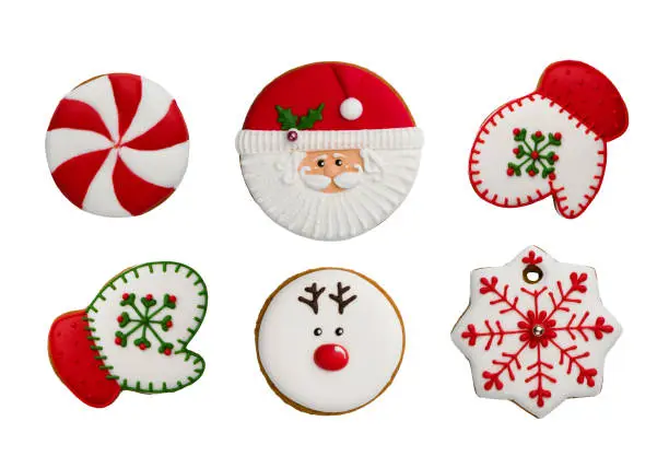 Various homemade Christmas cookies top view isolated on white background
