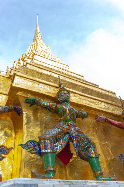istock Ramayana demon statue and Golden Pagoda 1060907592
