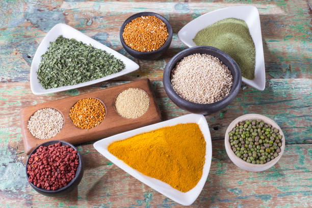 istock collection of super foods in several containers arranged randomly on the table 1060907704