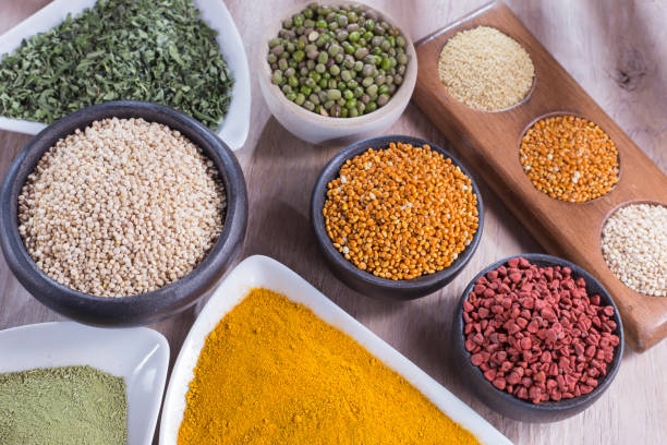 istock collection of super foods in several containers arranged randomly on the table 1060910168