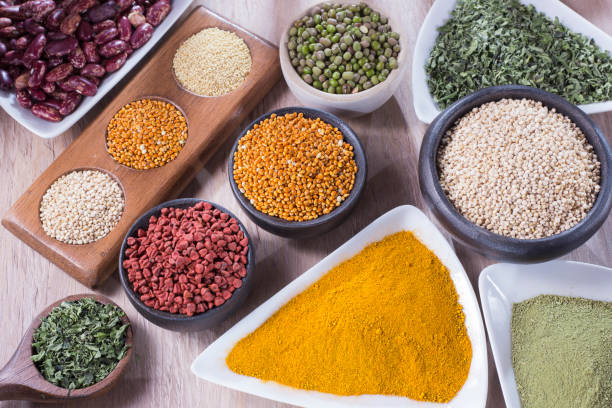 istock collection of super foods in several containers arranged randomly on the table 1060910414