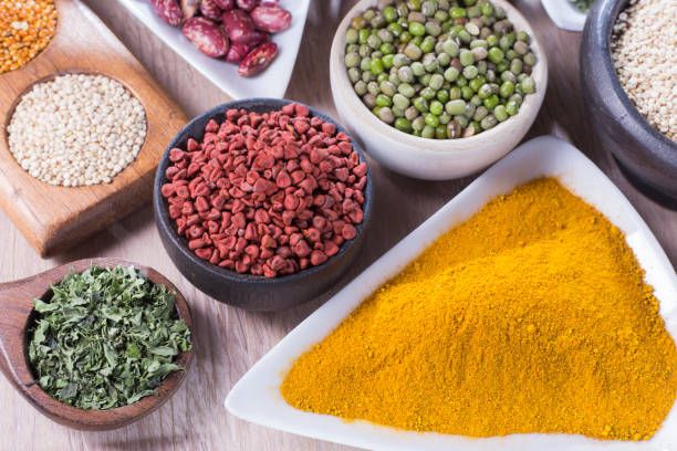 istock collection of super foods in several containers arranged randomly on the table 1060910586