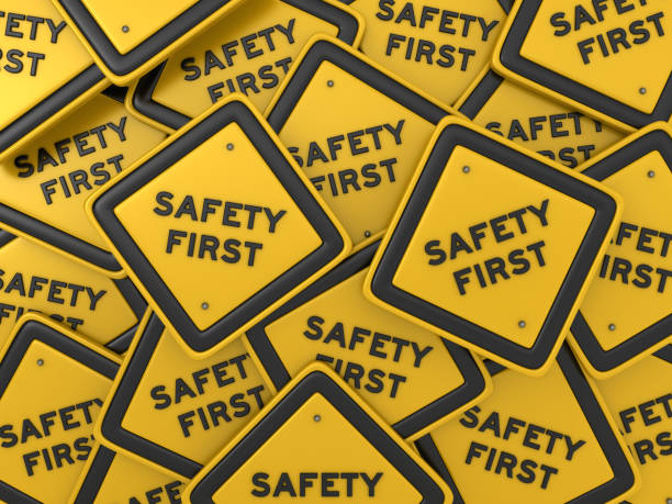safety first road sign - 3d rendering - sicurezza sul posto di lavoro foto e immagini stock