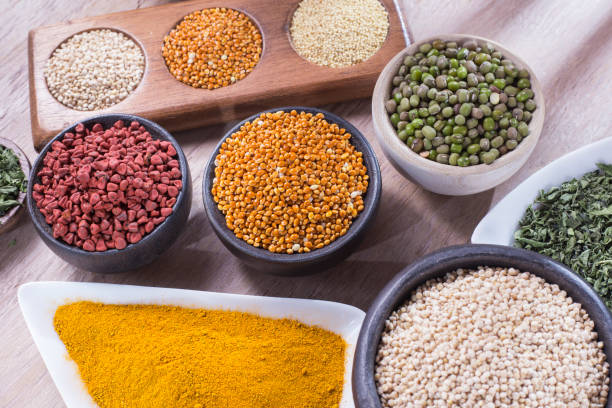 istock collection of super foods in several containers arranged randomly on the table 1060912192