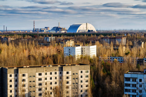 View from roof of 16-storied apartment house in Pripyat town, Chernobyl Nuclear Power Plant Zone of Alienation, Ukraine View from roof of 16-storied apartment house in Pripyat town, Chernobyl Nuclear Power Plant Zone of Alienation, Ukraine pripyat city photos stock pictures, royalty-free photos & images