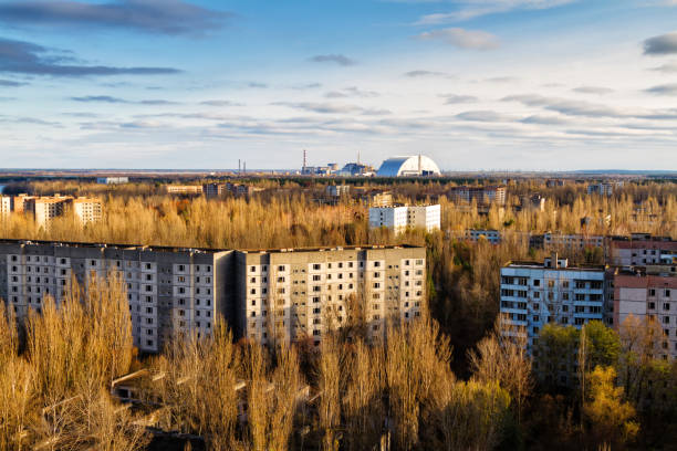 View from roof of 16-storied apartment house in Pripyat town, Chernobyl Nuclear Power Plant Zone of Alienation, Ukraine View from roof of 16-storied apartment house in Pripyat town, Chernobyl Nuclear Power Plant Zone of Alienation, Ukraine pripyat city photos stock pictures, royalty-free photos & images
