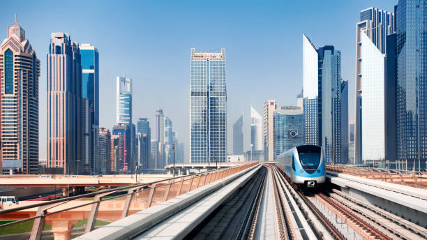 View from first railway carriage. Dubai city skyline panorama. Beautiful urban landscape of UAE in the day stock photo