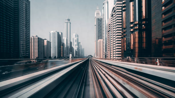 istock View from first railway carriage. Speed motion blur metro abstract background in the day 1060914546