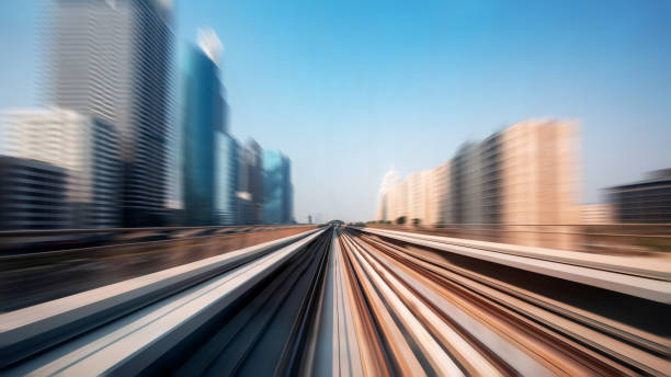 istock View from first railway carriage. Speed motion blur metro abstract background in the day 1060914678