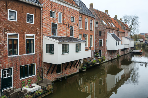 The famous hanging kitchens above the canal Damsterdiep in the village Appingedam in The Netherlands