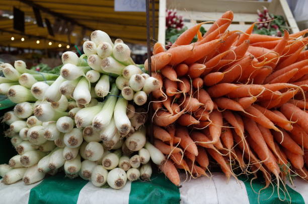 vegetable retail display in farmer market in Paris