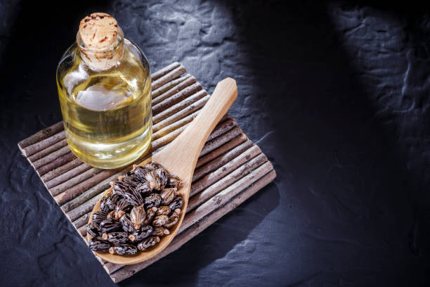 istock beans and castor oil on the black table 1060930706