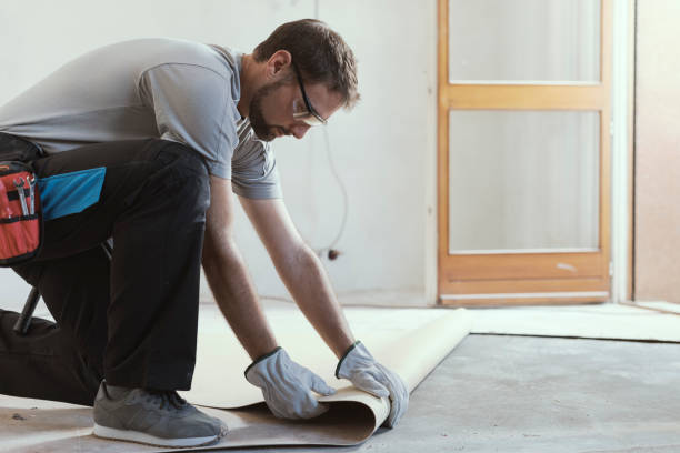 istock Contractor removing an old linoleum flooring 1060933692