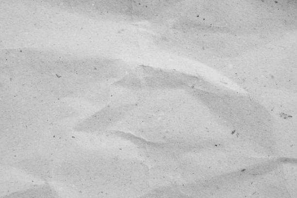 istock crumpled white paper background texture concept for design 1060933896