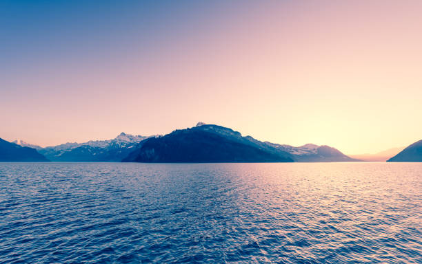 istock Exquisite landscape mountain range in sunset light. Lake Lucerne 1060934050