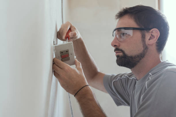istock Professional electrician, installing sockets at home 1060934074