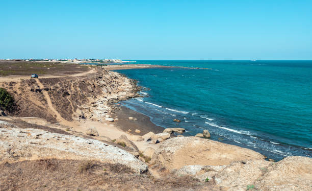 istock Rocky sea coast with turquoise water on the beach 1060934270