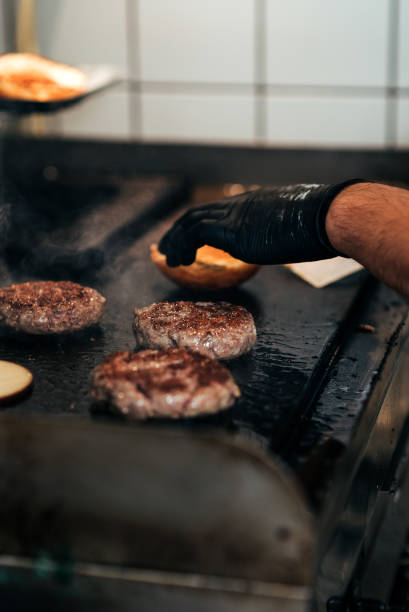 istock Preparing meat in fast food restaurant. 1060936900