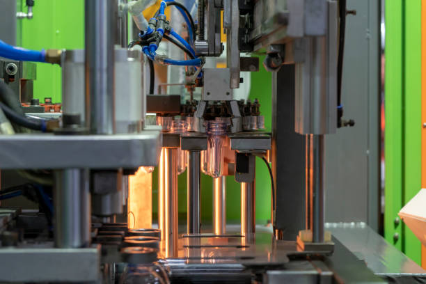 istock The  operation of  plastic bottle blowing process at the drinking factory. 1060936924
