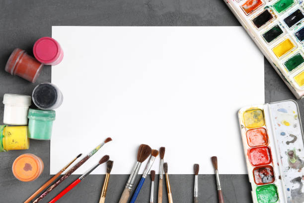 istock paints and brushes for painting 1060942378