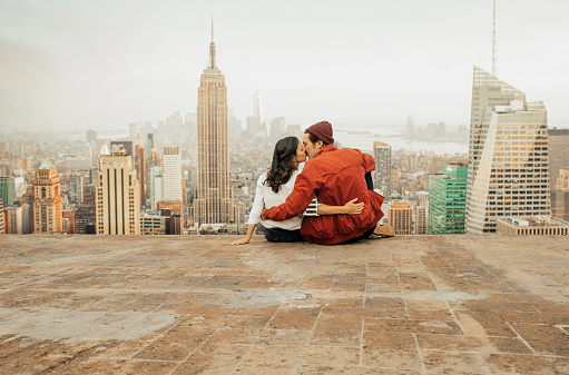 Rear view of couple embracing in New York