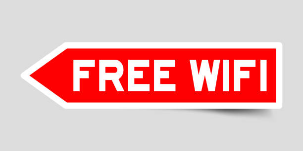 istock Sticker in red color arrow shape with word free wifi on gray background 1060951300
