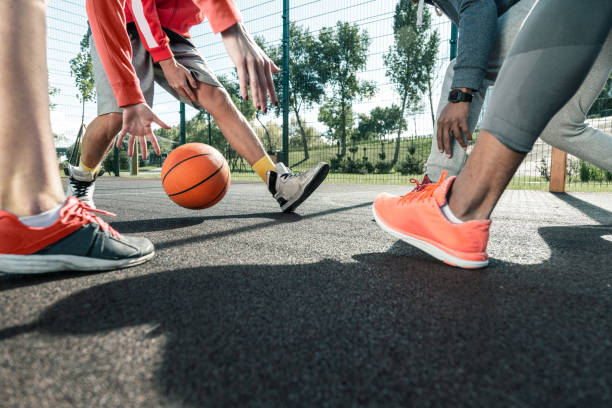 istock Basketball ball being passed to different players 1060956154