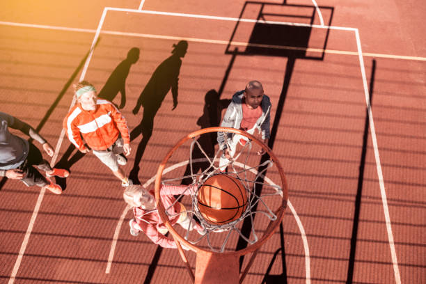 istock Top view of a ball going through the basket 1060957022