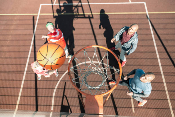 istock Top view of a ball flying into the basket 1060957078