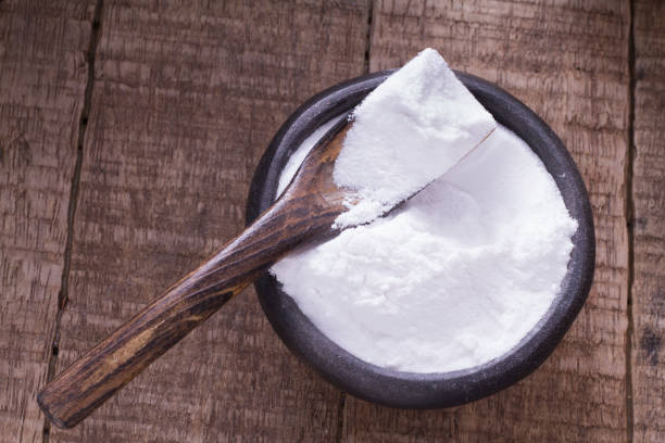 istock baking soda in bowl on wooden table 1060961418