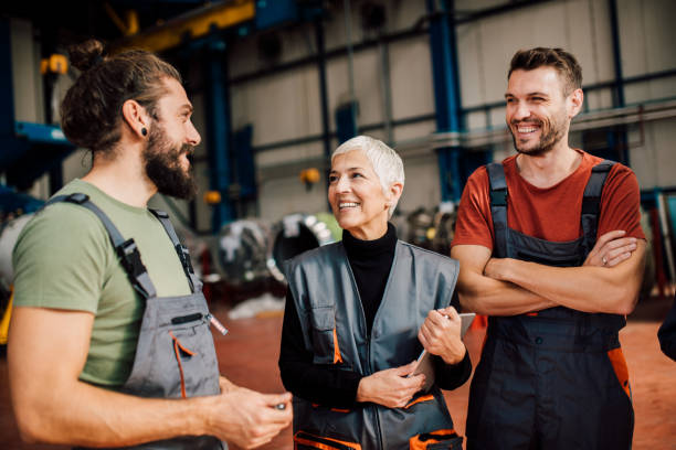istock Senior engineer with younger coworkers 1060965060