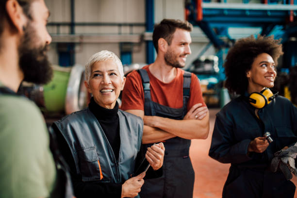 Happy engineers at aircraft hangar