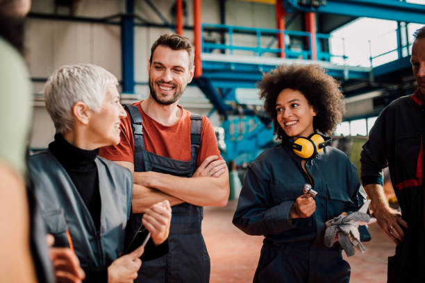 istock Joyful coworkers at airplane hangar 1060965110