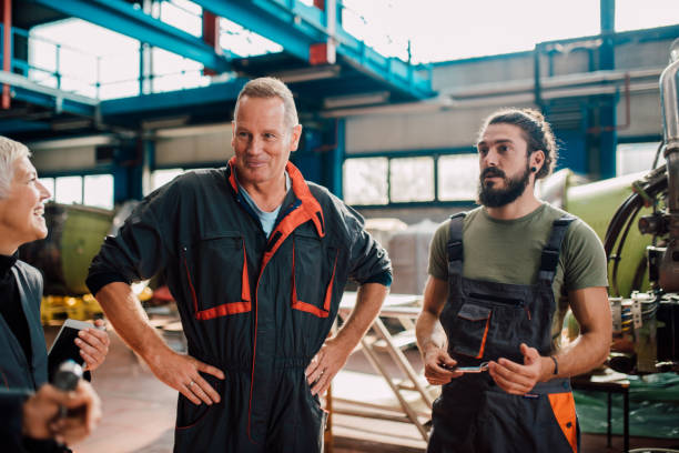istock Mechanics at aircraft hangar 1060965112