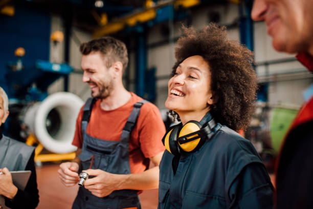 istock Happy mechanic  with headphones 1060965216