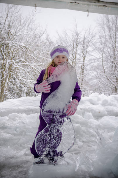 istock child in icy kingdom in winter time 1060966094