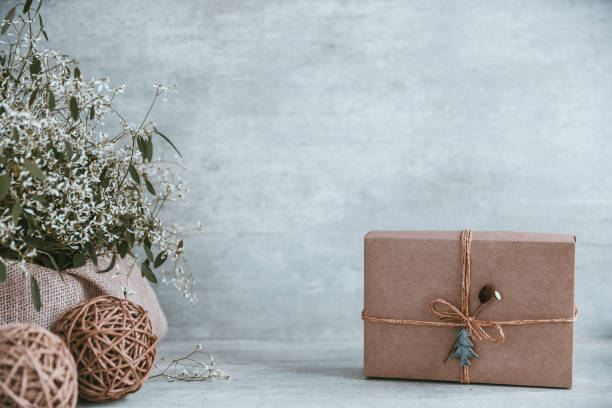 istock Beautiful and modern christmas gift composition on wooden background. Copy space, greeting card 1060971086