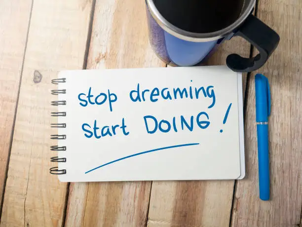 Photo of Stop Dreaming Start Doing, Motivational Words Quotes Concept
