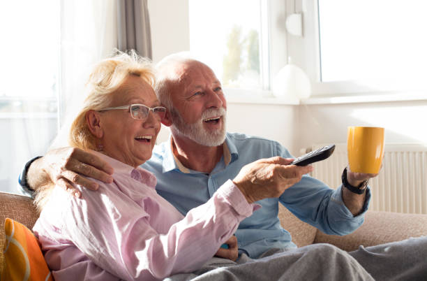 istock Senior couple watching tv 1060982960