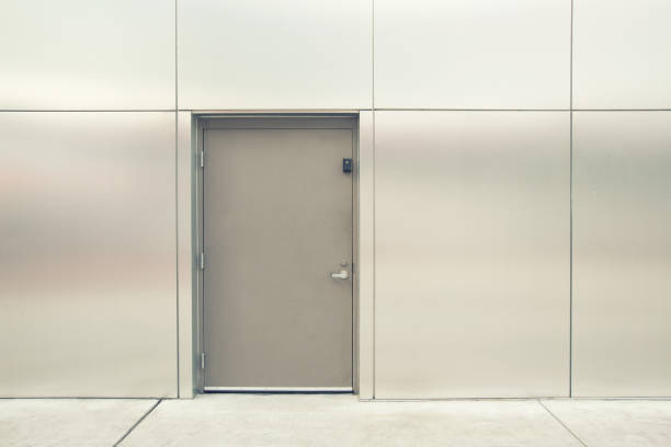 istock close grey door with aluminium or steel wall 1060985728