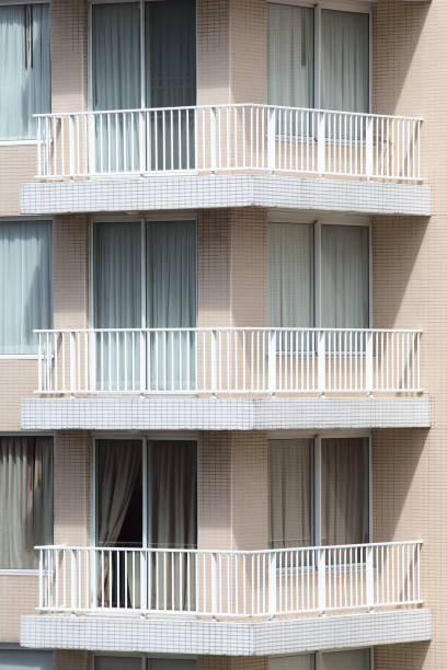 istock apartment building with terrace 1060985970