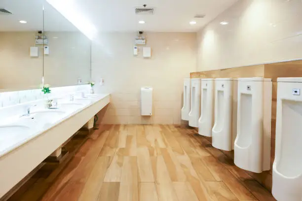 Toilet sink interior of public toilet with of washing hands and mirror ,clean toilet