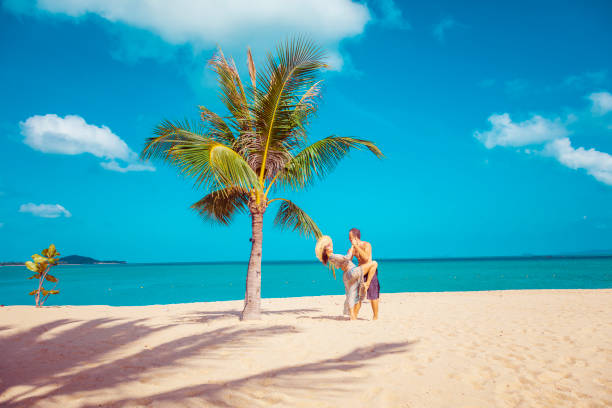 istock Couple on tropical beach 1060988518