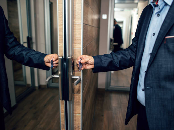 istock Businessman opening his hotel room 1060990556