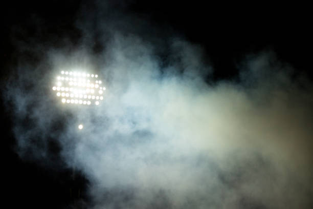 istock Light tower reflectors at a stadium during nightime. 1060991696