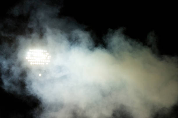 istock Light tower reflectors at a stadium during nightime. 1060991746