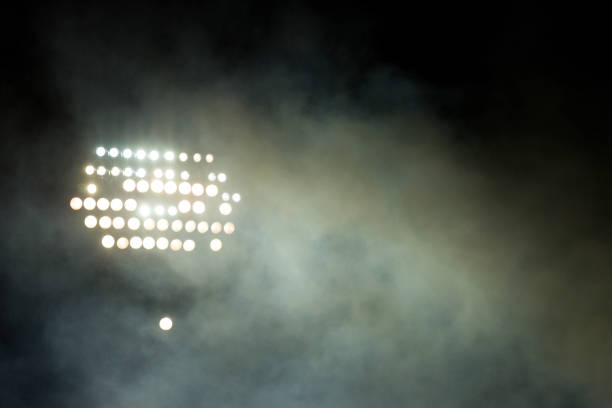istock Light tower reflectors at a stadium during nightime. 1060991886