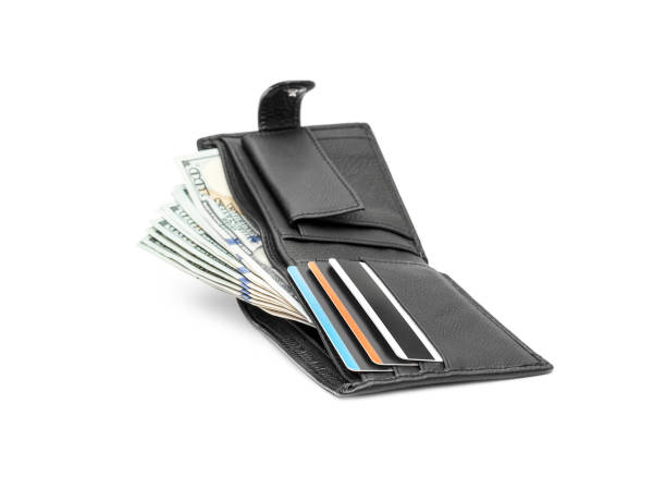 istock Wallet with dollar bills and credit cards on white. 1060998132