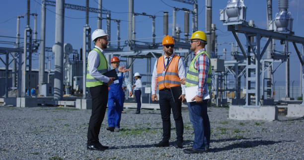 istock Group of diverse workers on solar plant 1061001878